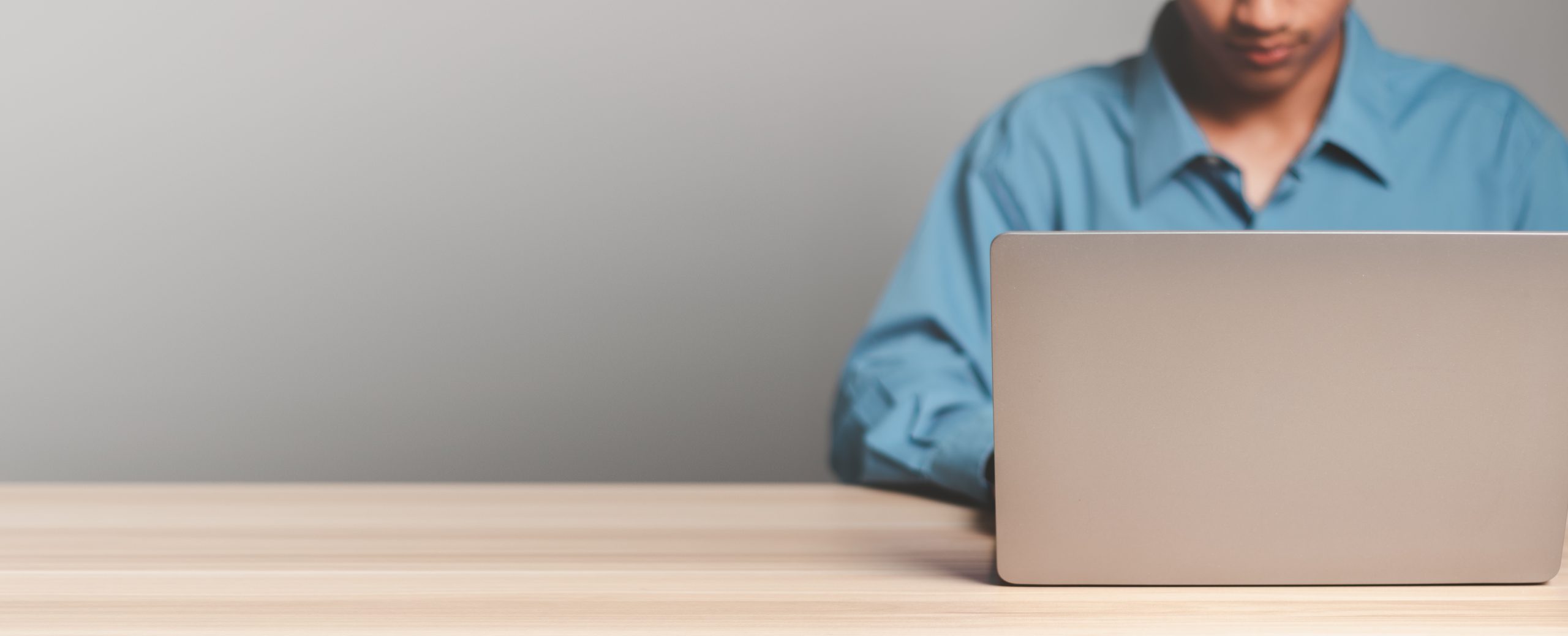 Businessman using laptop computer.